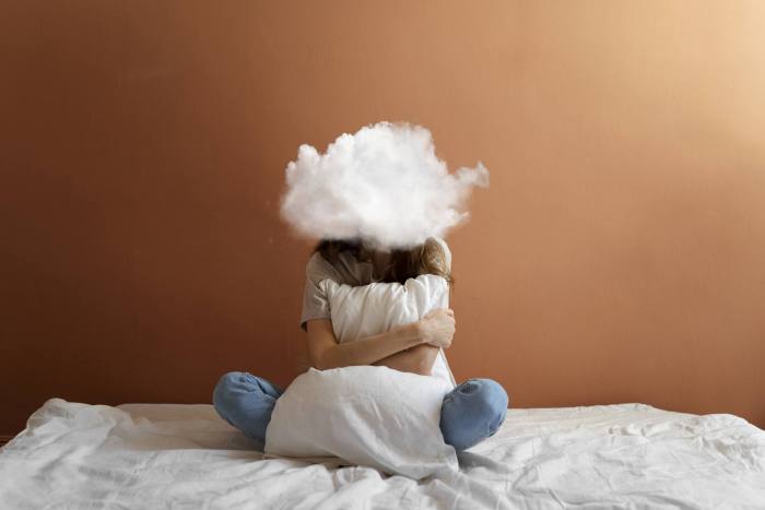 full shot model posing with cloud shaped head